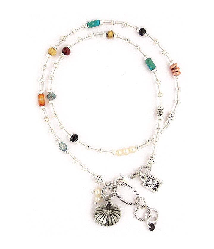 A sweet, delicate looking (but strong!) offering with crystal glass beads, silver plated brass beads, copper, pewter, freshwater pearls, turquoise, and silver plated and antiqued brass chain. Very pretty. Bracelet or necklace. 15.5”-16.75”