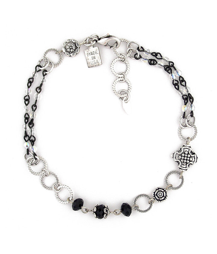 Very stylish! A classic color combo of jet, crystal and silver. Here we have crystal, black plated glass bead chain, pewter and sterling plated brass. Goes with everything! 9.25”-just over 10”